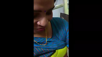 A Mature Indian Woman Receives Digital Stimulation From A Co-Worker In A Professional Setting