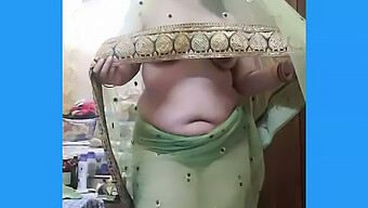 Mature Indian Housewife Playfully Exposes Her Husband'S Gaze With Her Net Saree